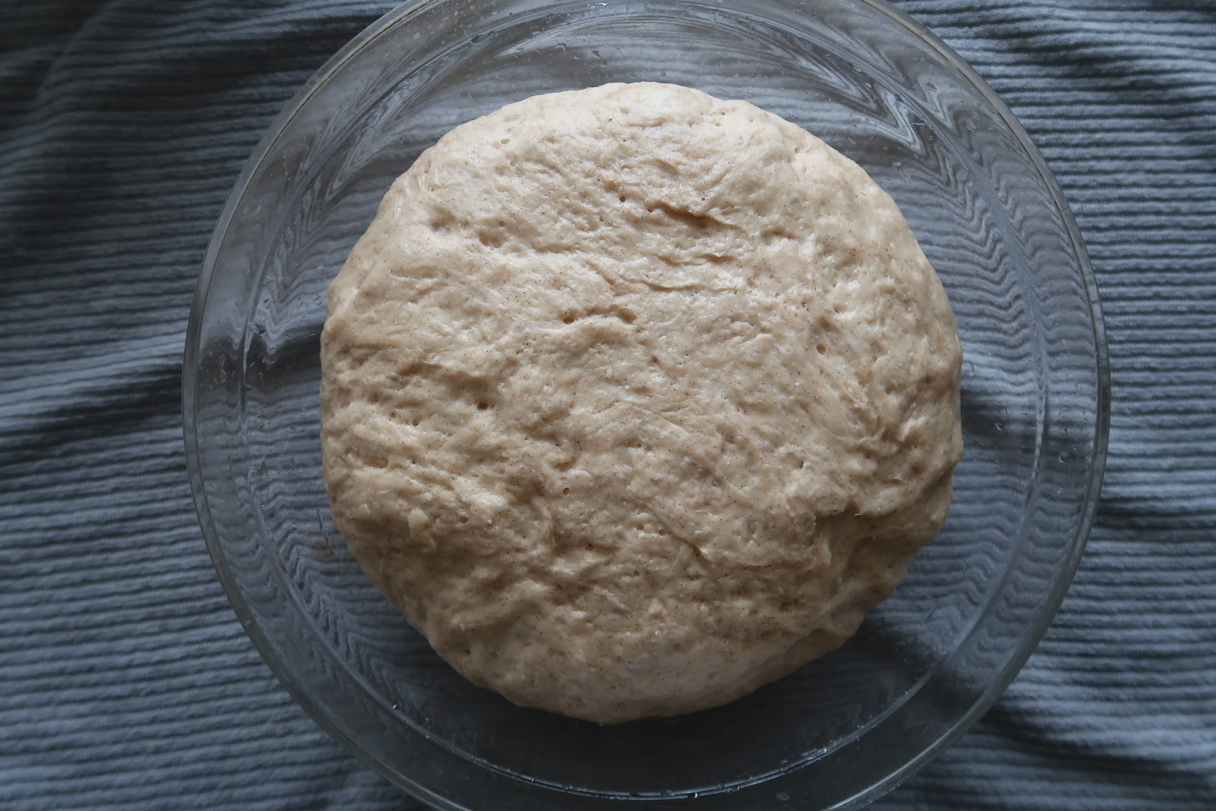 Proofed cinnamon roll dough.