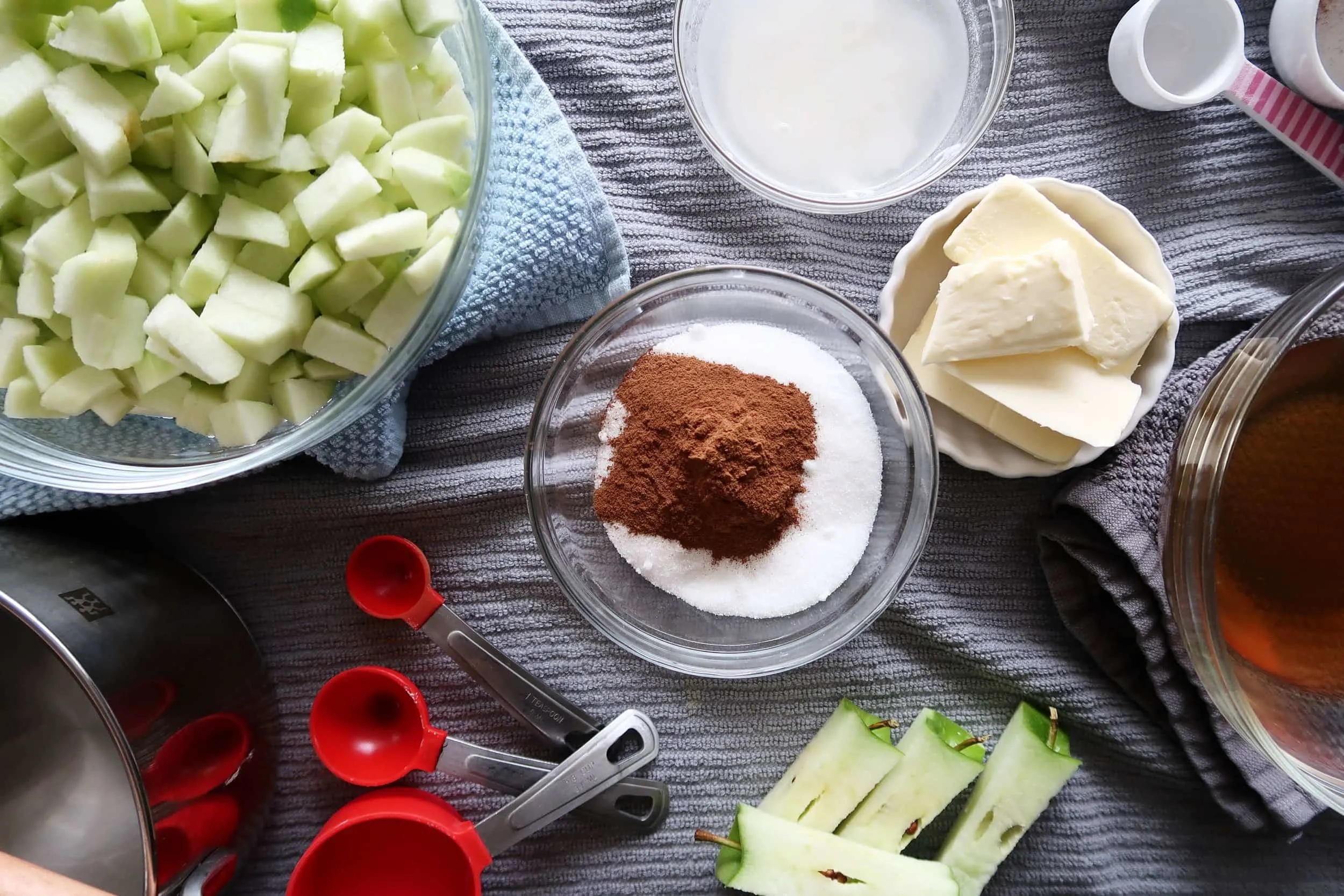 Diced apples, cinnamon, sugar, vanilla extract, butter, and apple cider vinegar.