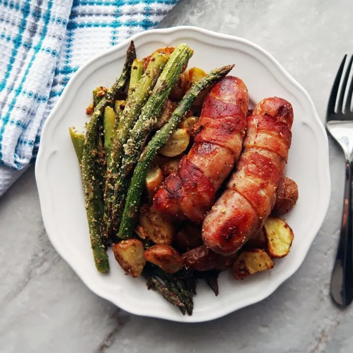 Bacon-Wrapped Sausages with Garlic Parmesan Asparagus and Potatoes