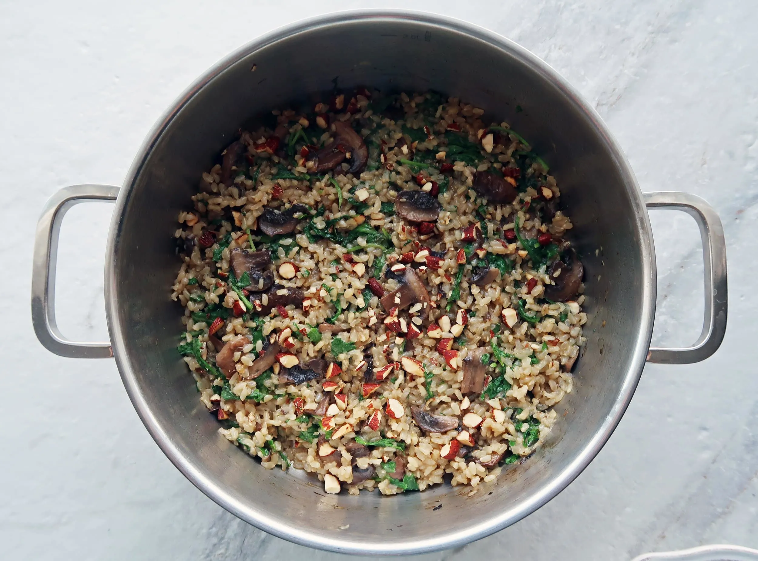 A pot of cooked brown rice pilaf.