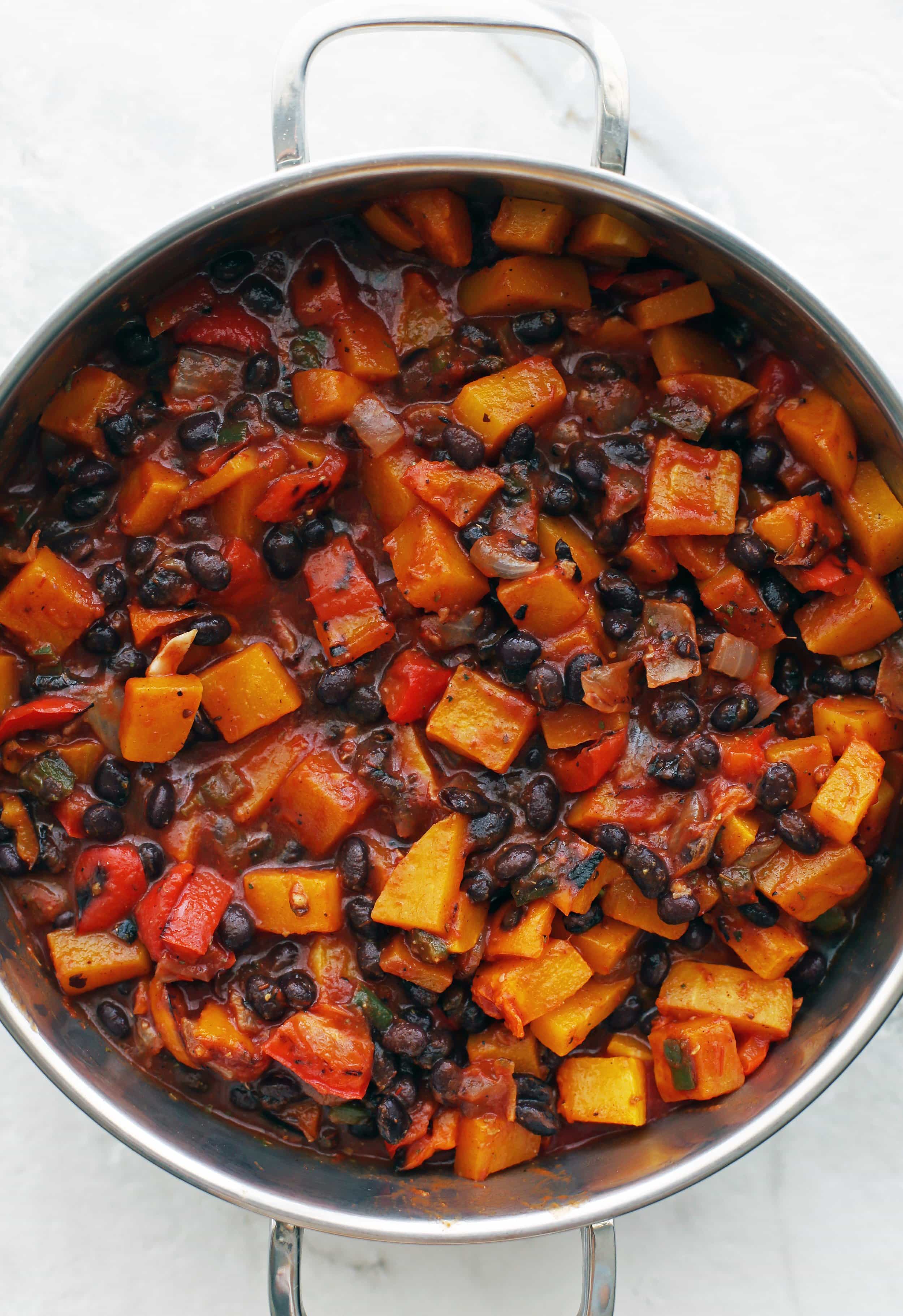 Roasted Butternut Squash and Black Bean Chili in a large metal pot.