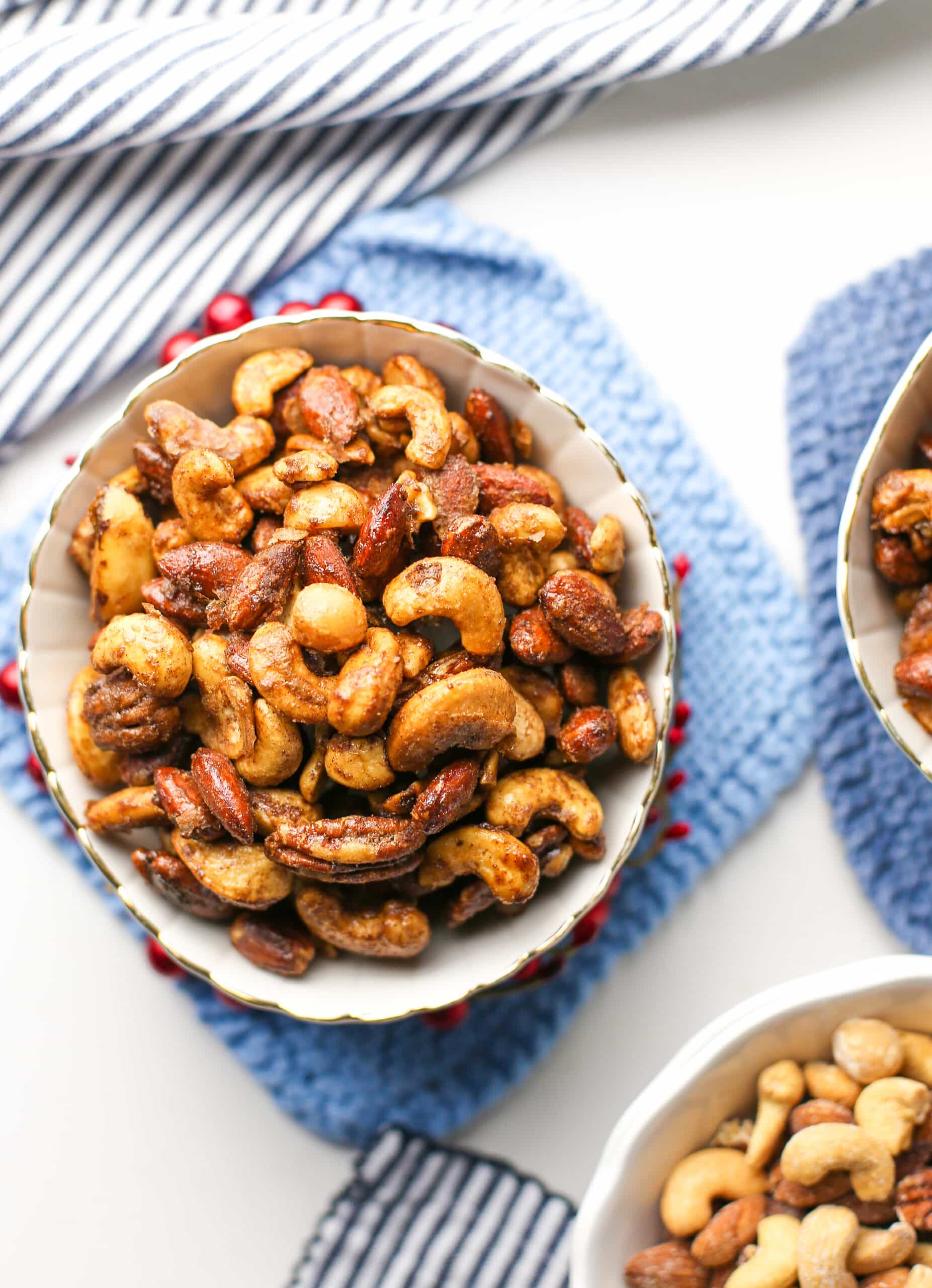 Overhead view of a bowl of cinnamon sugar mixed nuts.