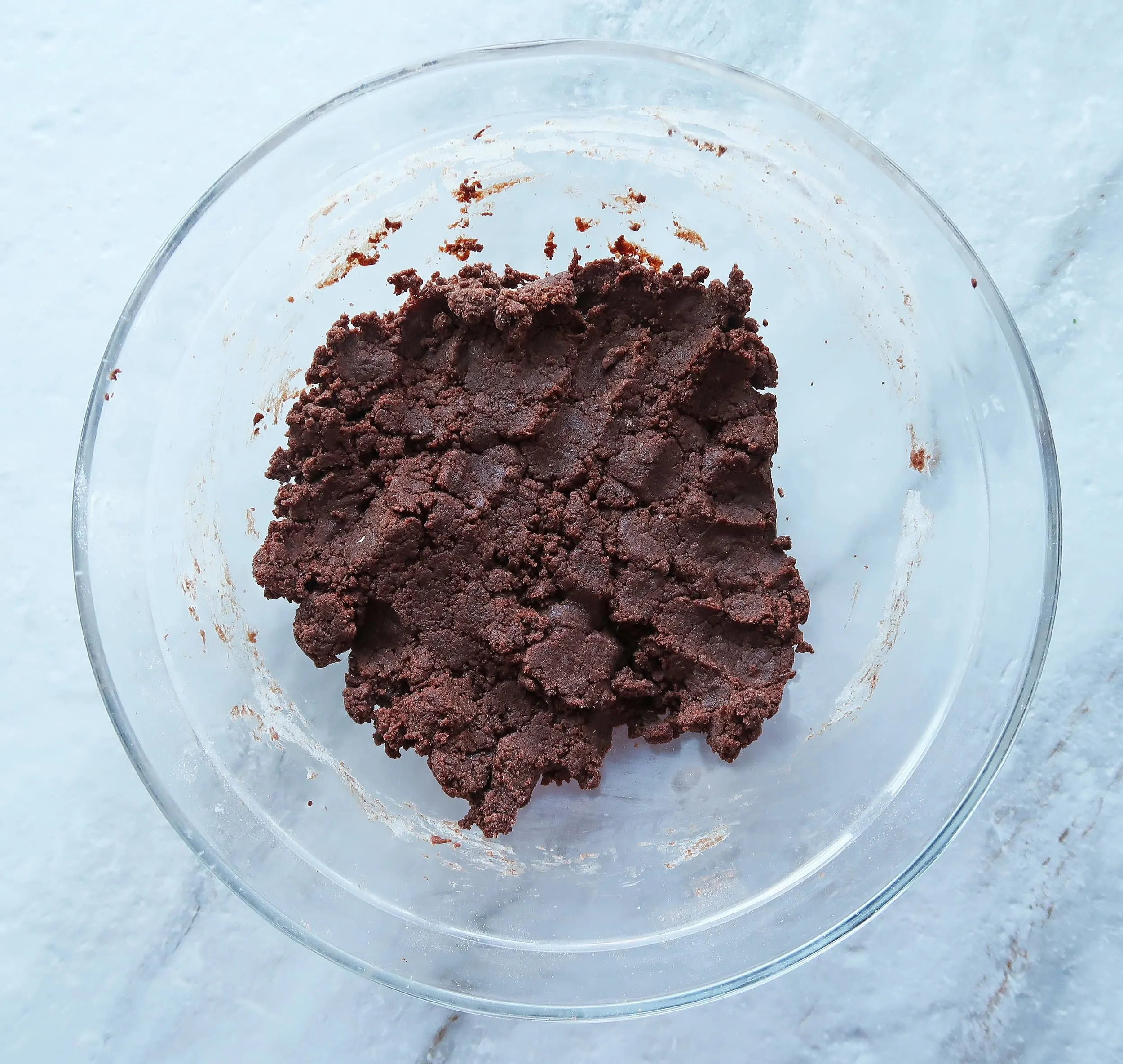 Chocolate cookie dough in a bowl.