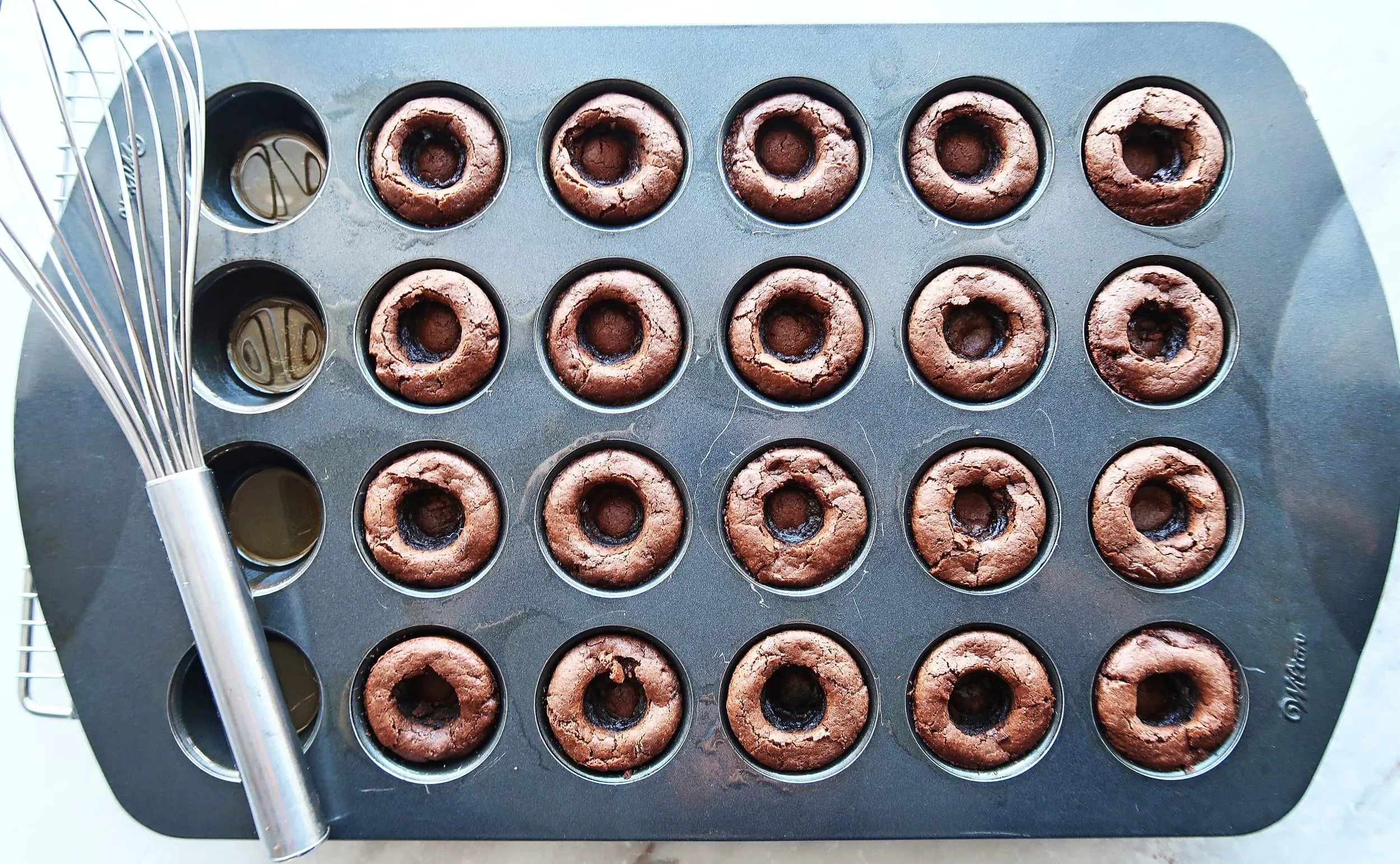 Chocolate cookie dough formed into cups.