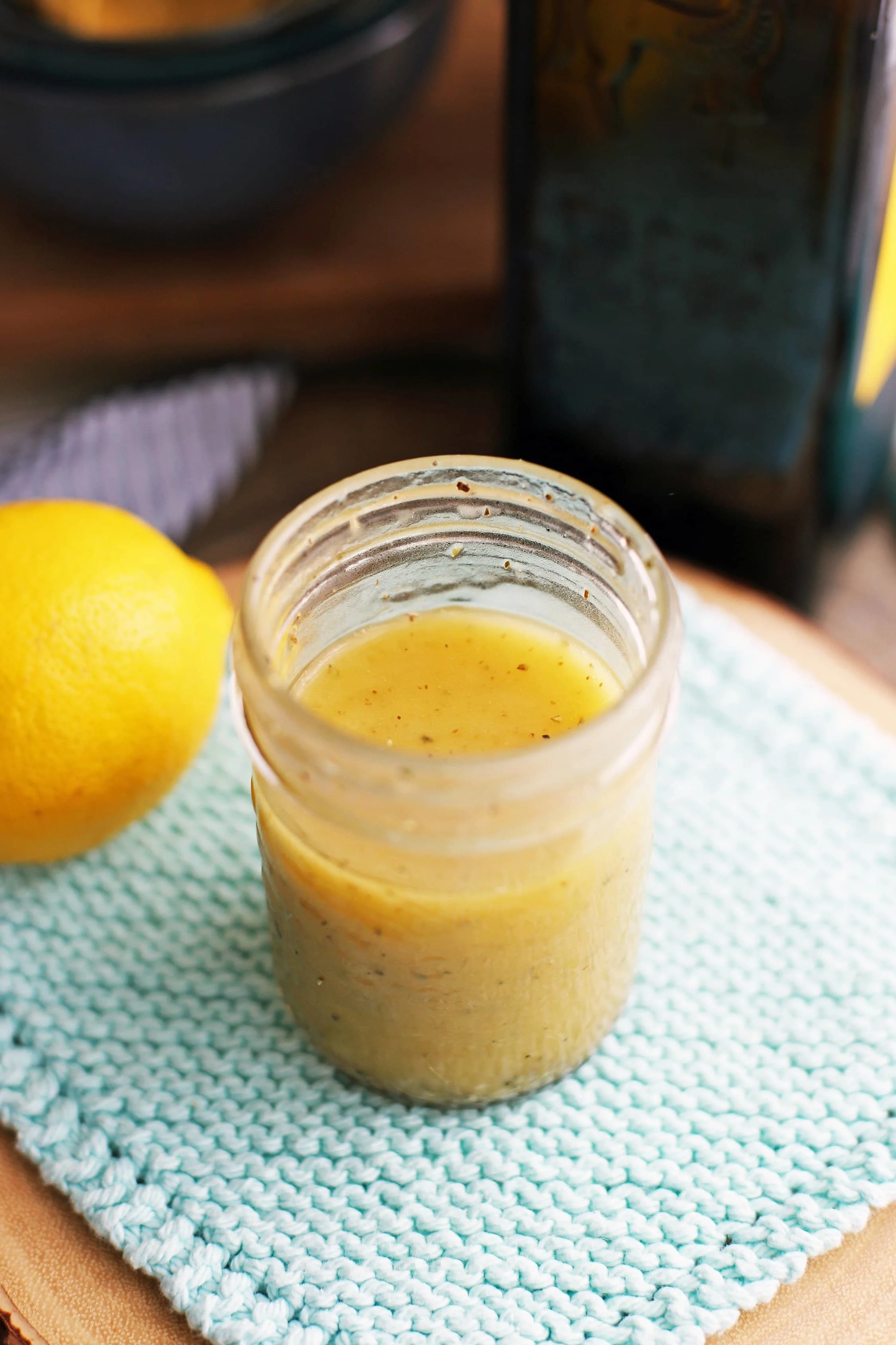 A mason jar containing homemade lemon vinaigrette.