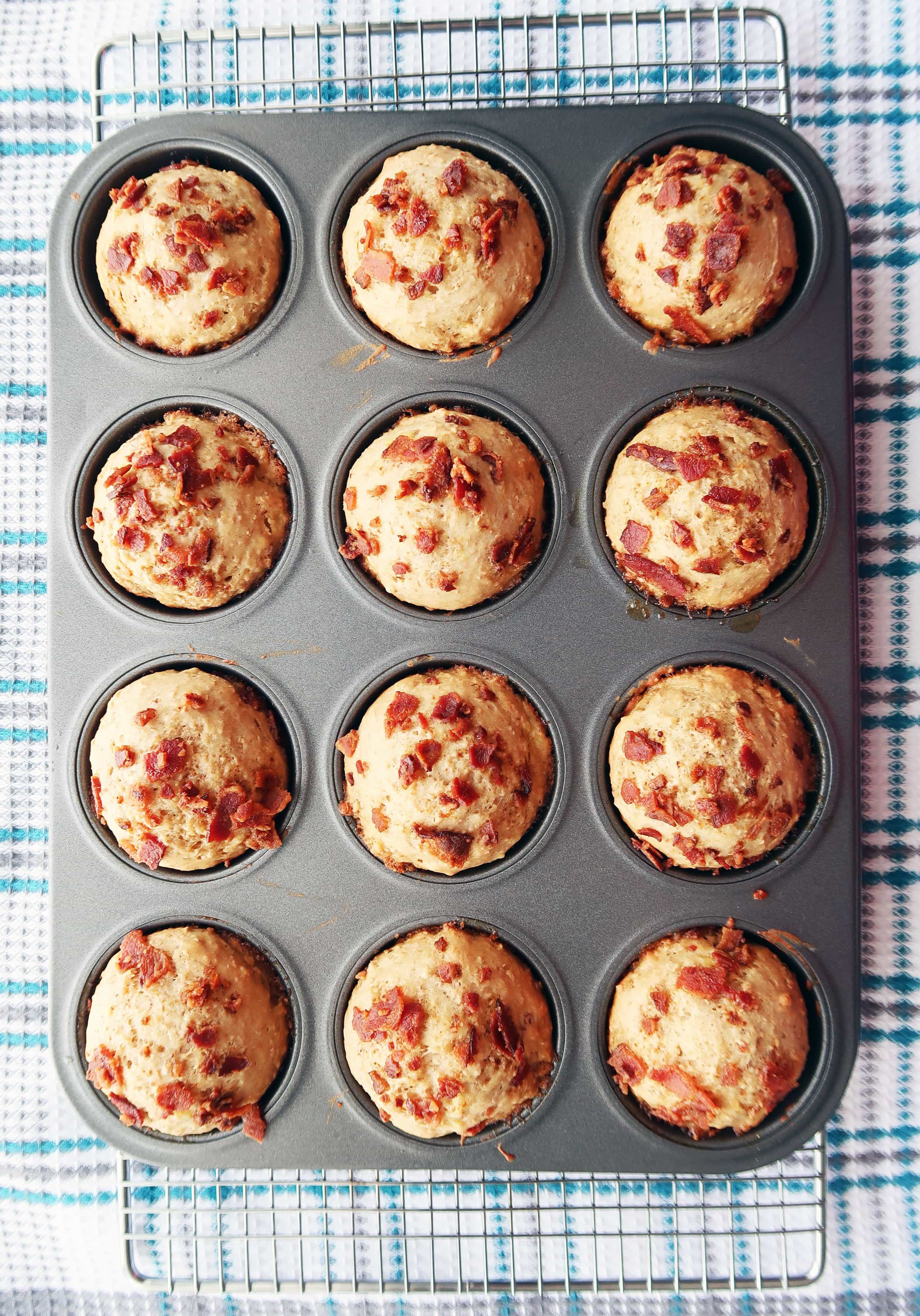 Healthier Maple Bacon Banana Muffins cooling on a rack.