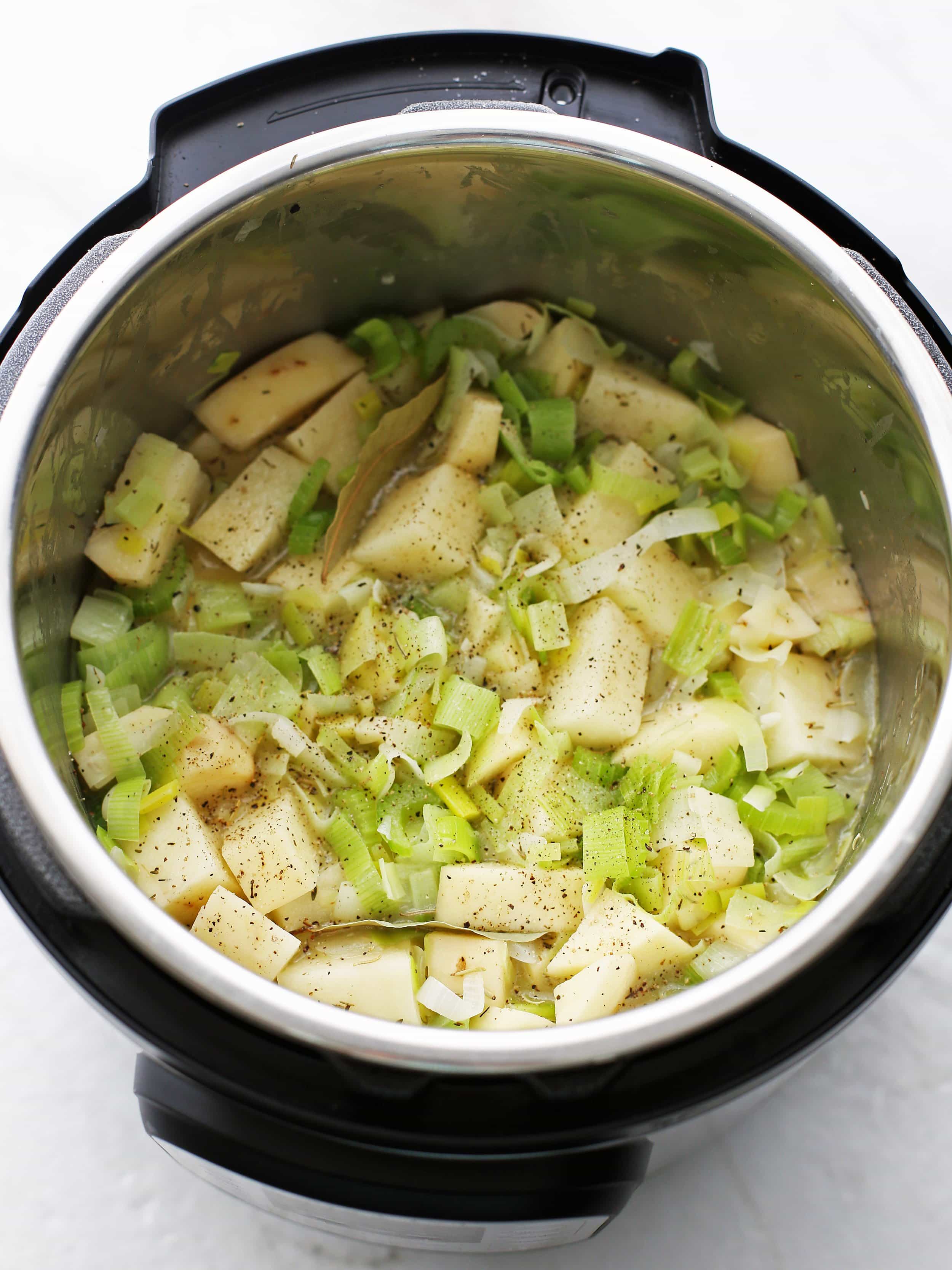 Potato and leek soup ingredients in the Instant Pot.
