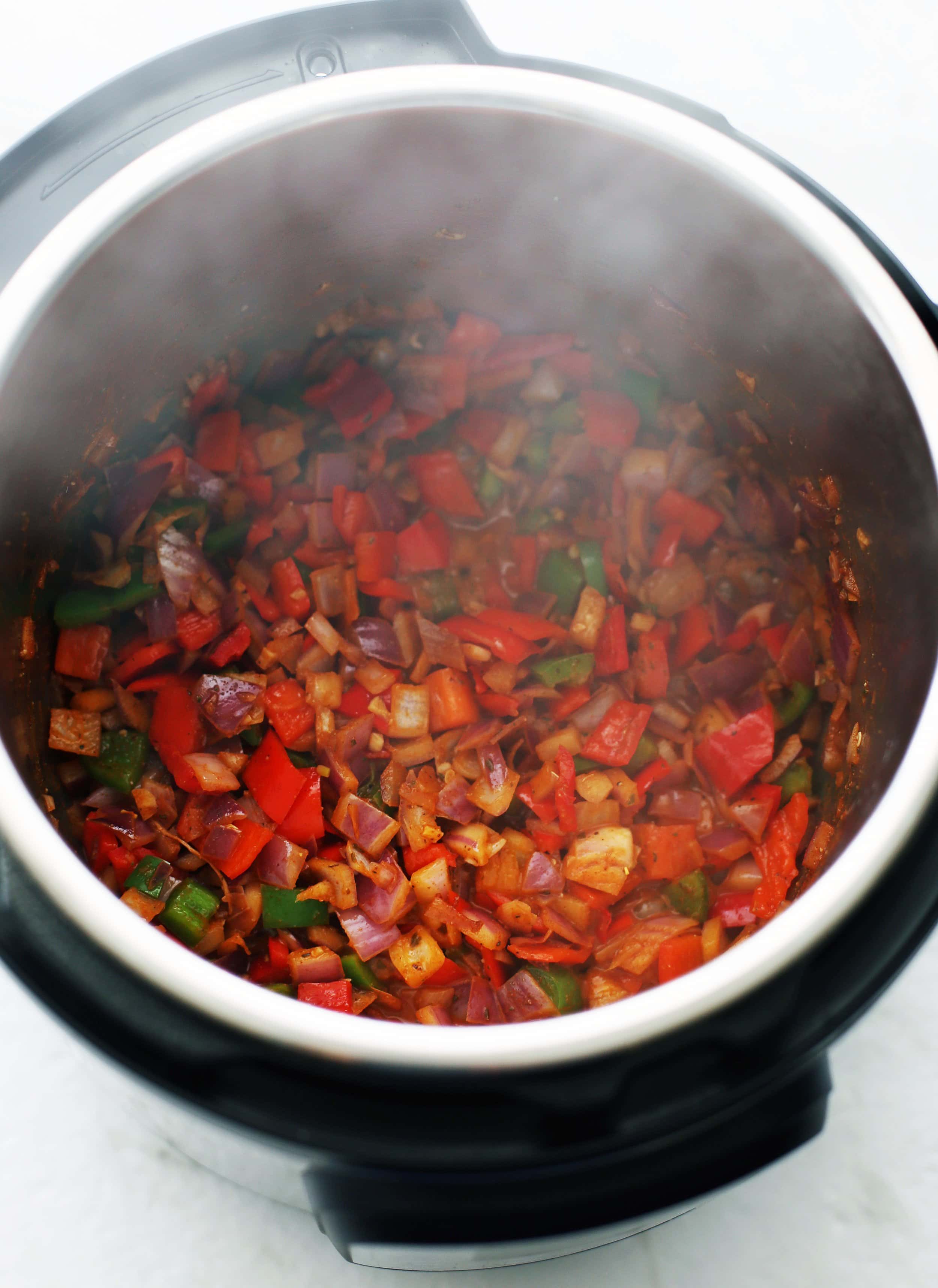 Sauteed and spiced chopped peppers, onions, and garlic in the Instant Pot.