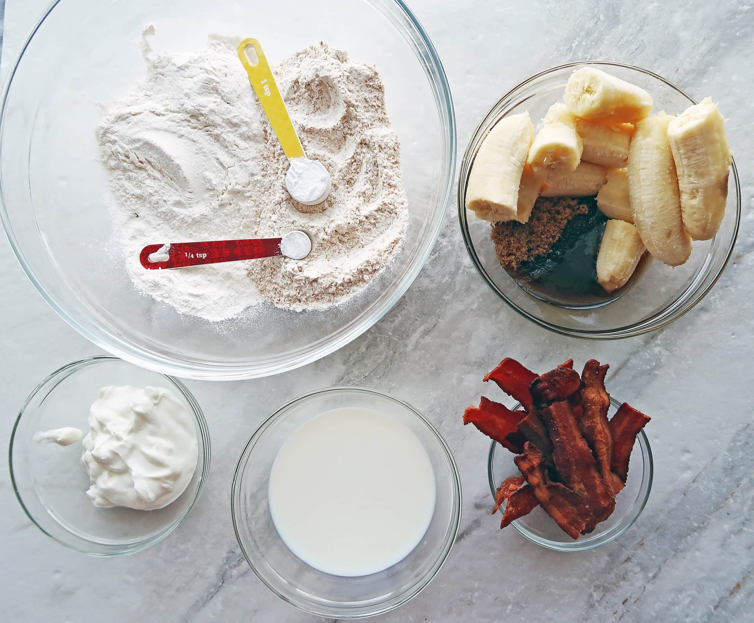 Flour, milk, yogurt, bacon, and bananas.