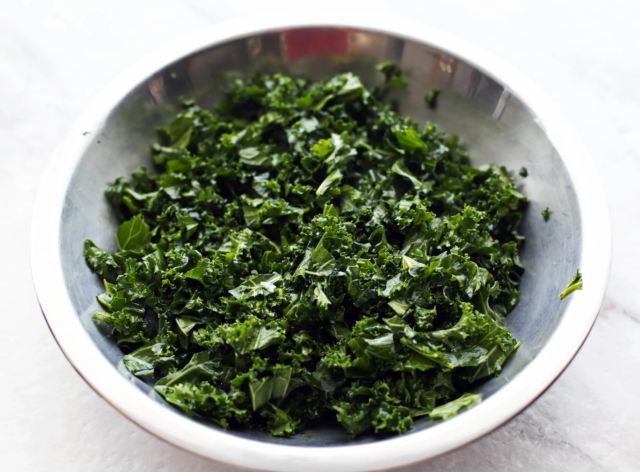 Finely chopped kale tossed with olive oil and salt.