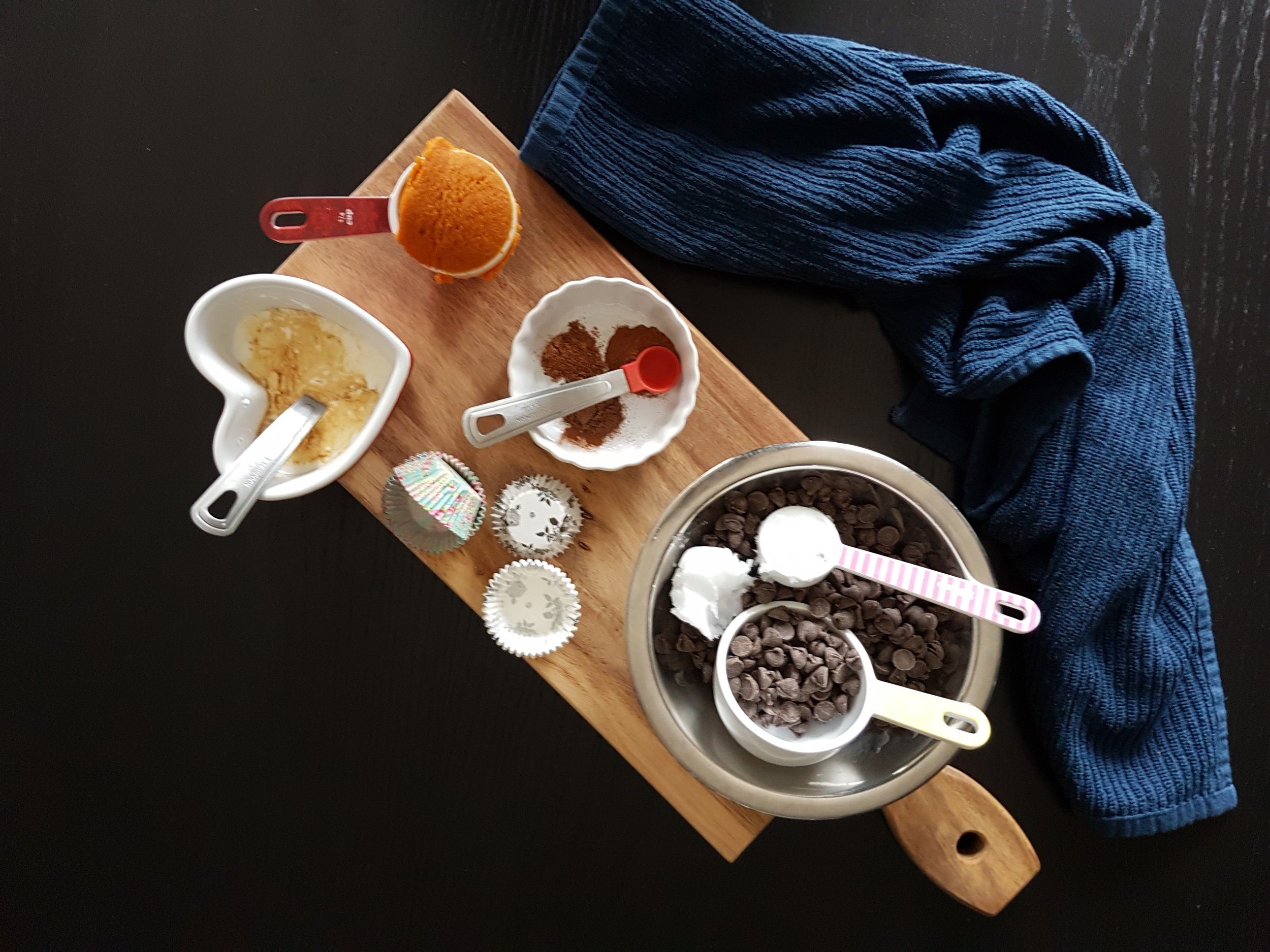 Chocolate chips, coconut oil, heavy cream, pumpkin puree, and spices.