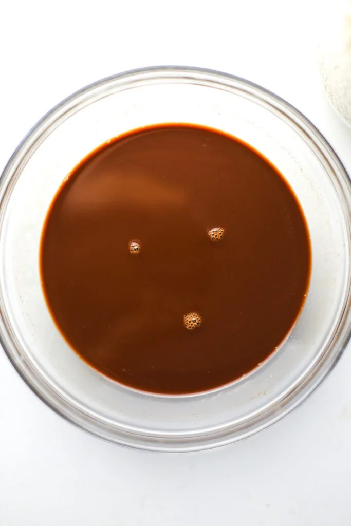 Overhead view of homemade mocha in a glass bowl.