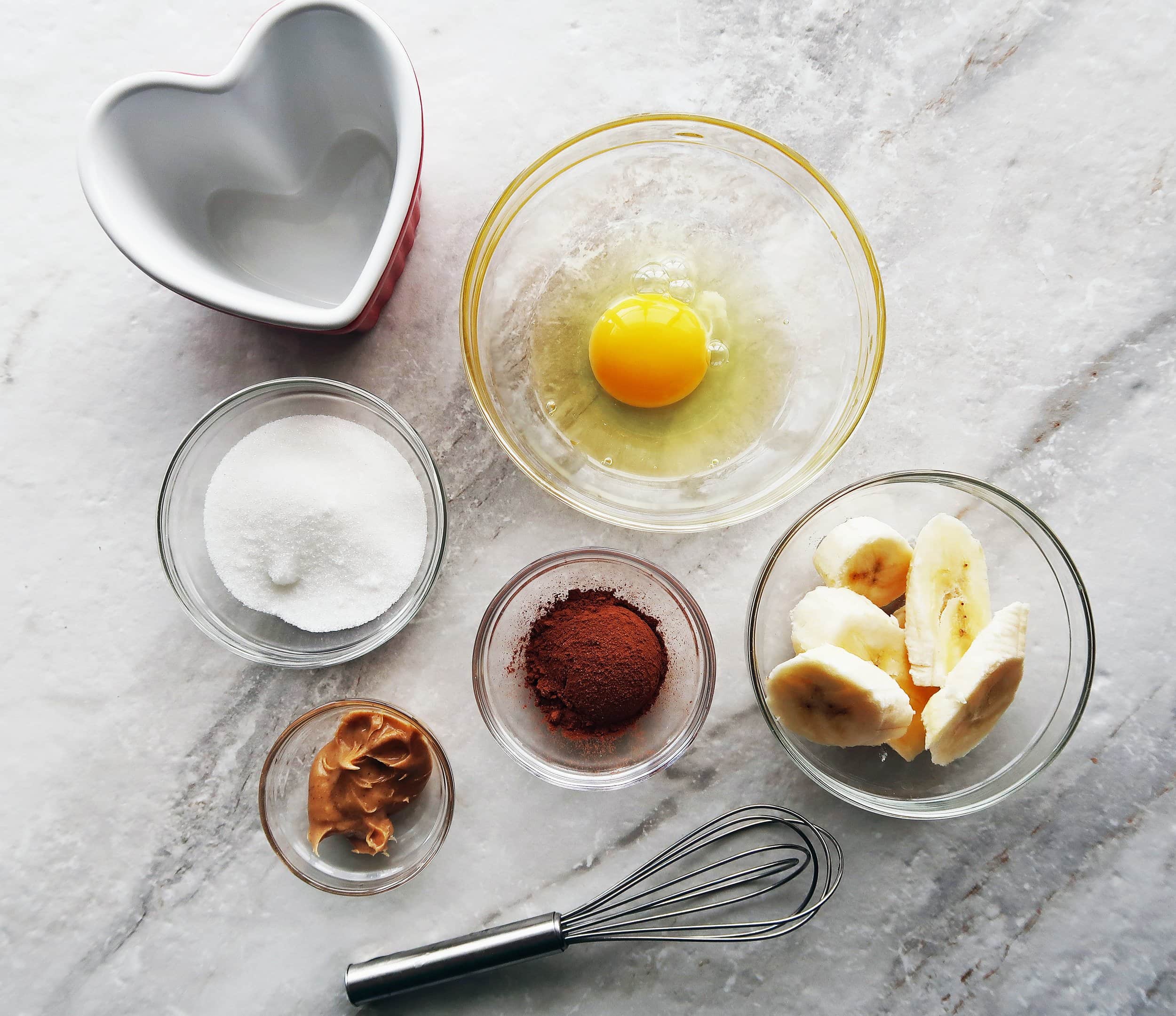 Sugar, an egg, cocoa powder, bananas, and peanut butter.