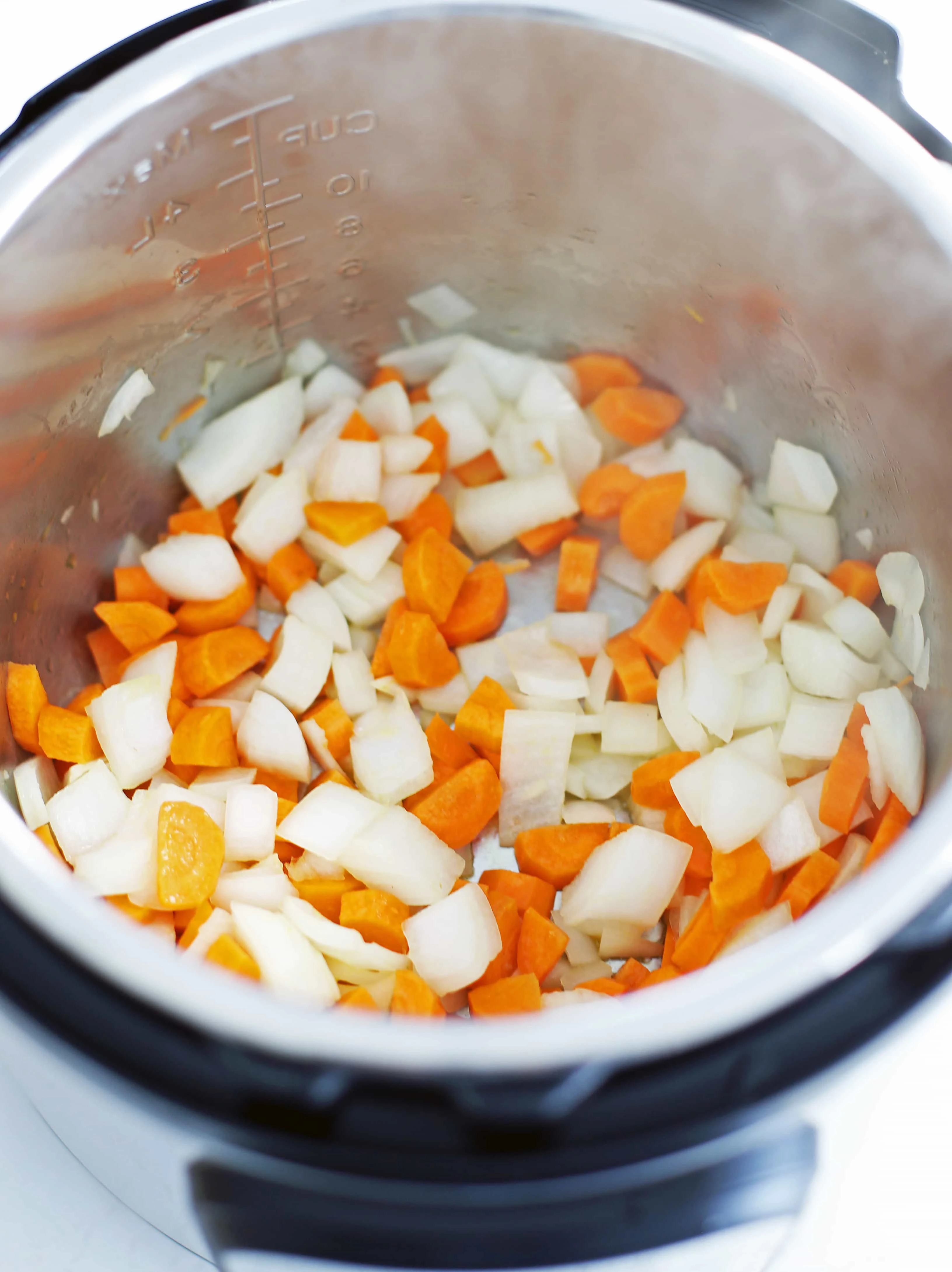 Sauteed onions and carrots in the Instant Pot.