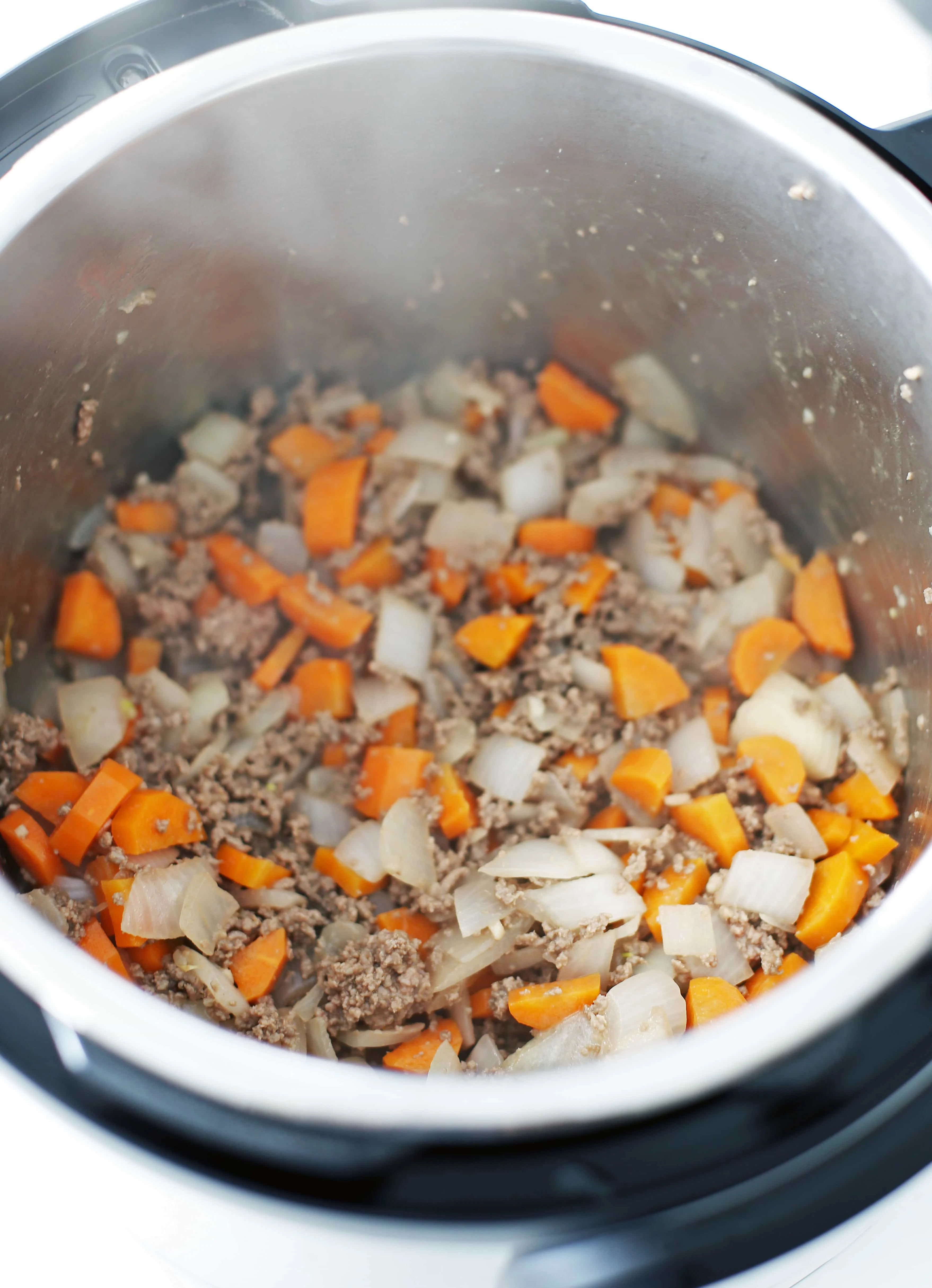Sauteed vegetables and ground beef in the Instant Pot.