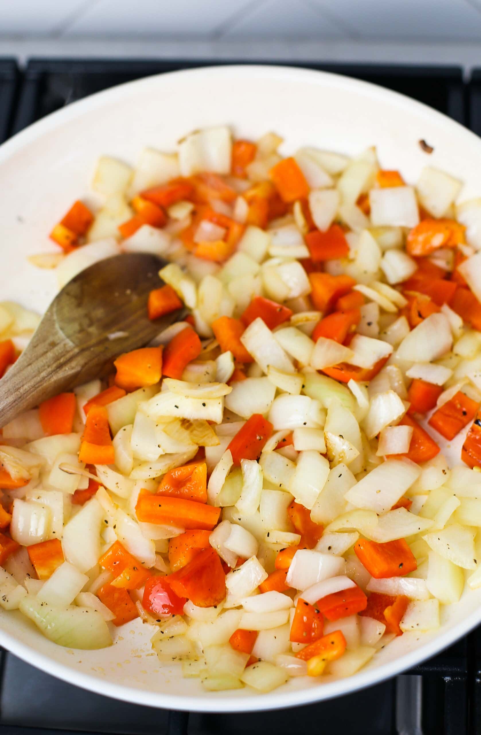 Sautéed bell pepper and onions in large skillet.