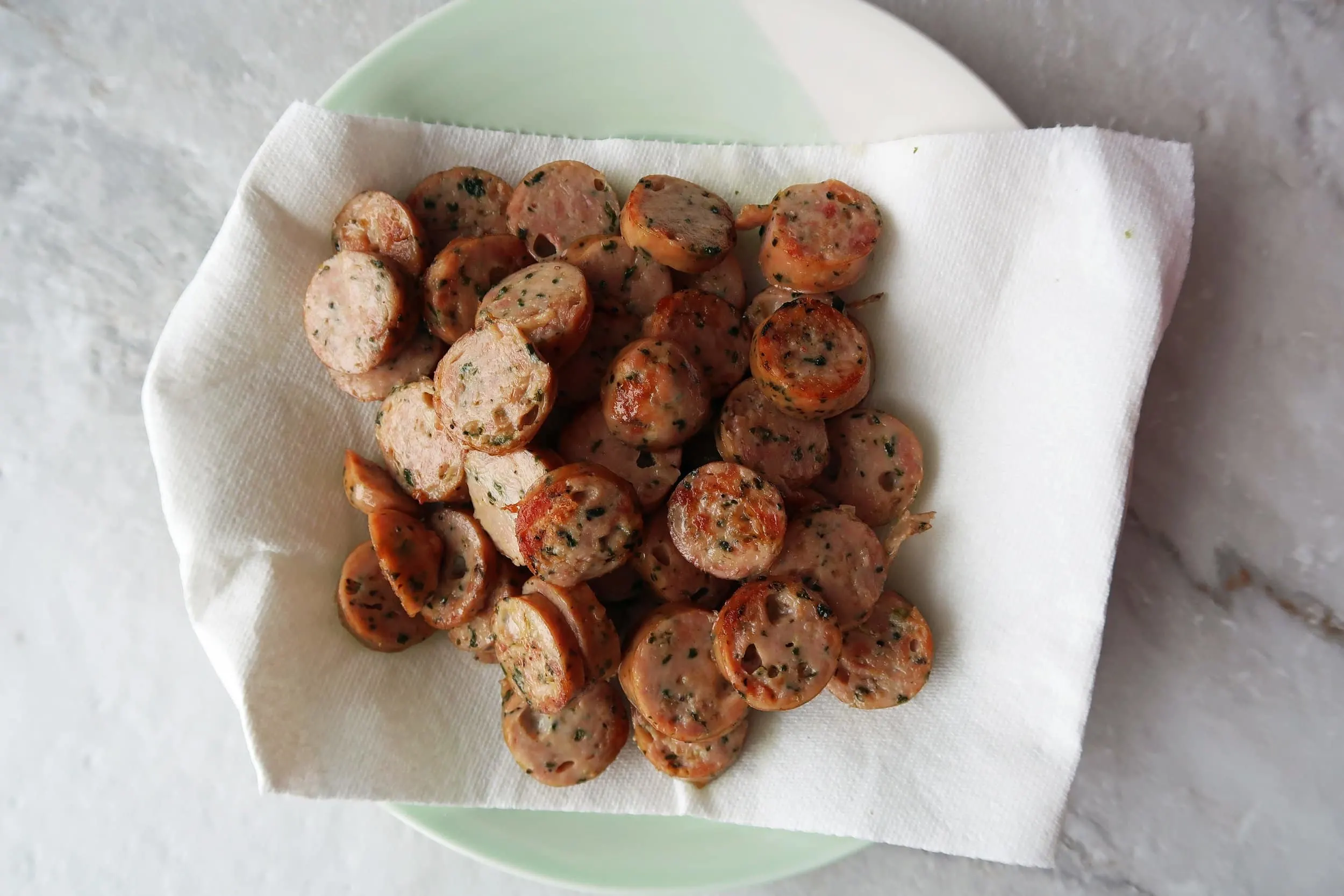 Sliced sausages on a plate.