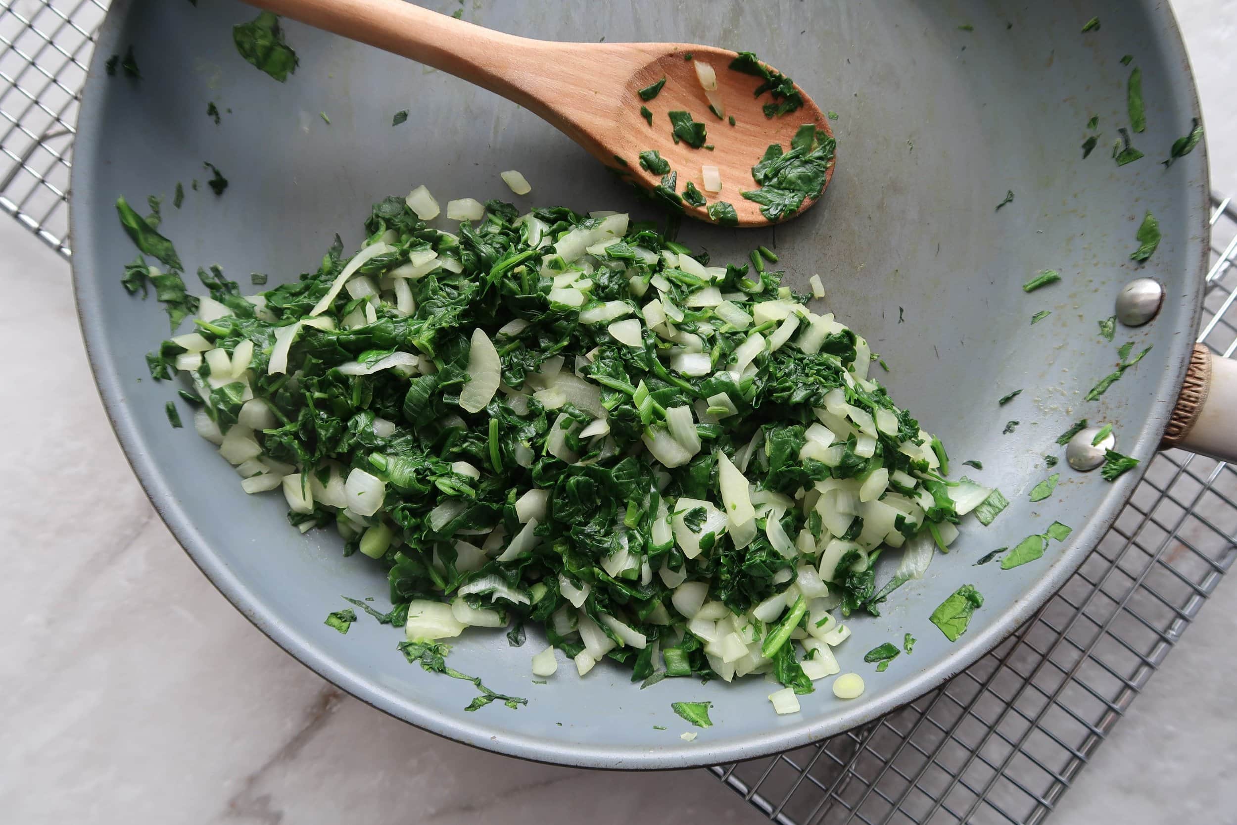 Sauted spinach, onions, green onions, and parsley.