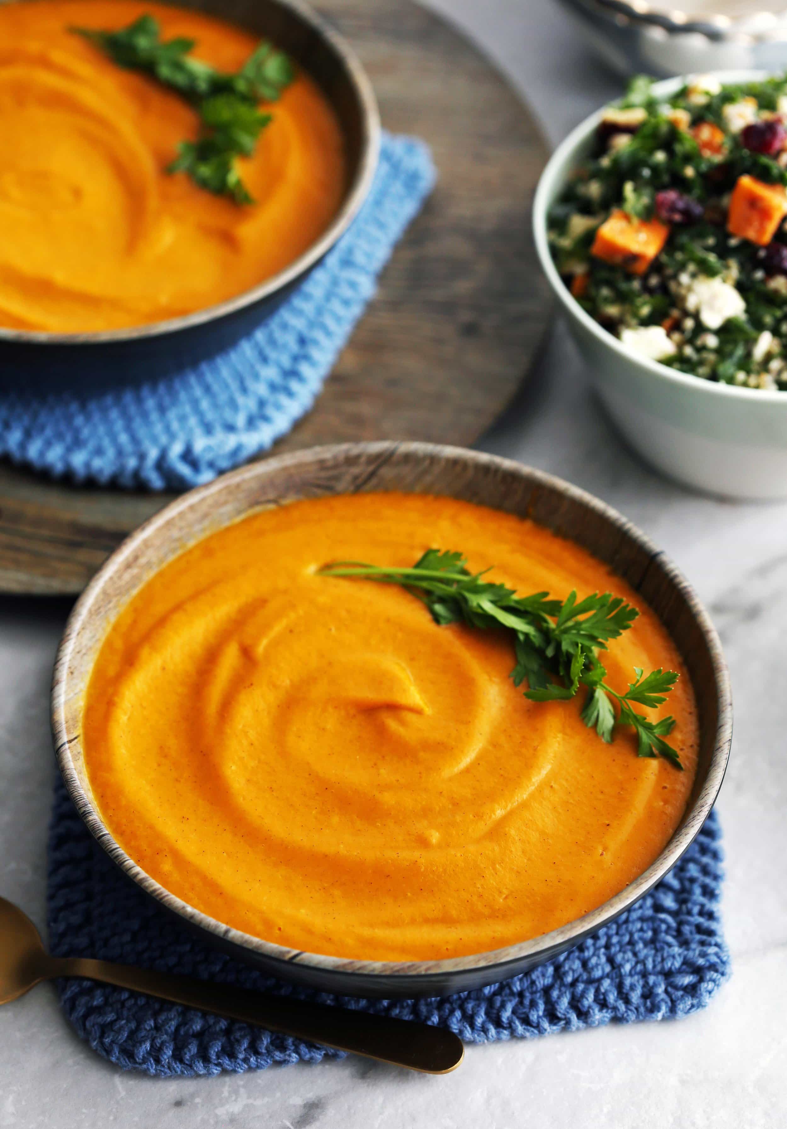 A closeup of bowl of sweet potato coconut soup made from the Instant Pot.