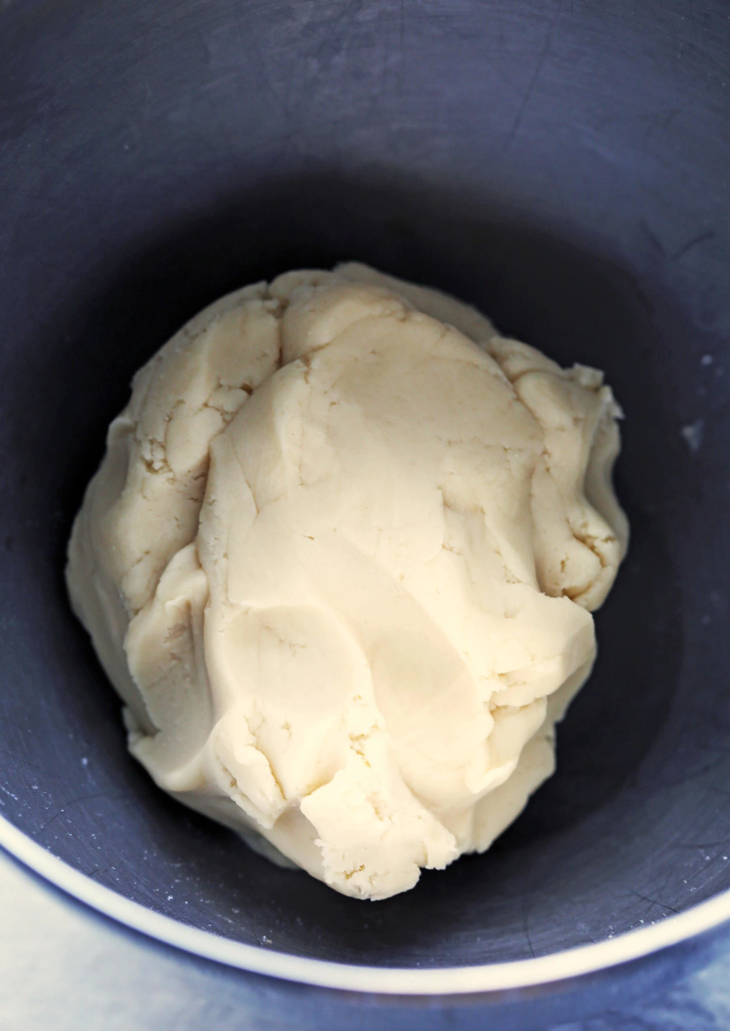 Shortbread Cookie dough in a large metal bowl.